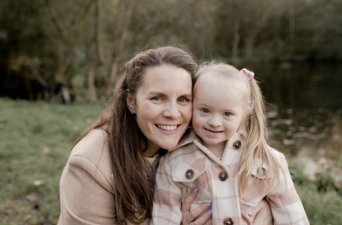 Mother and daughter posting for a picture