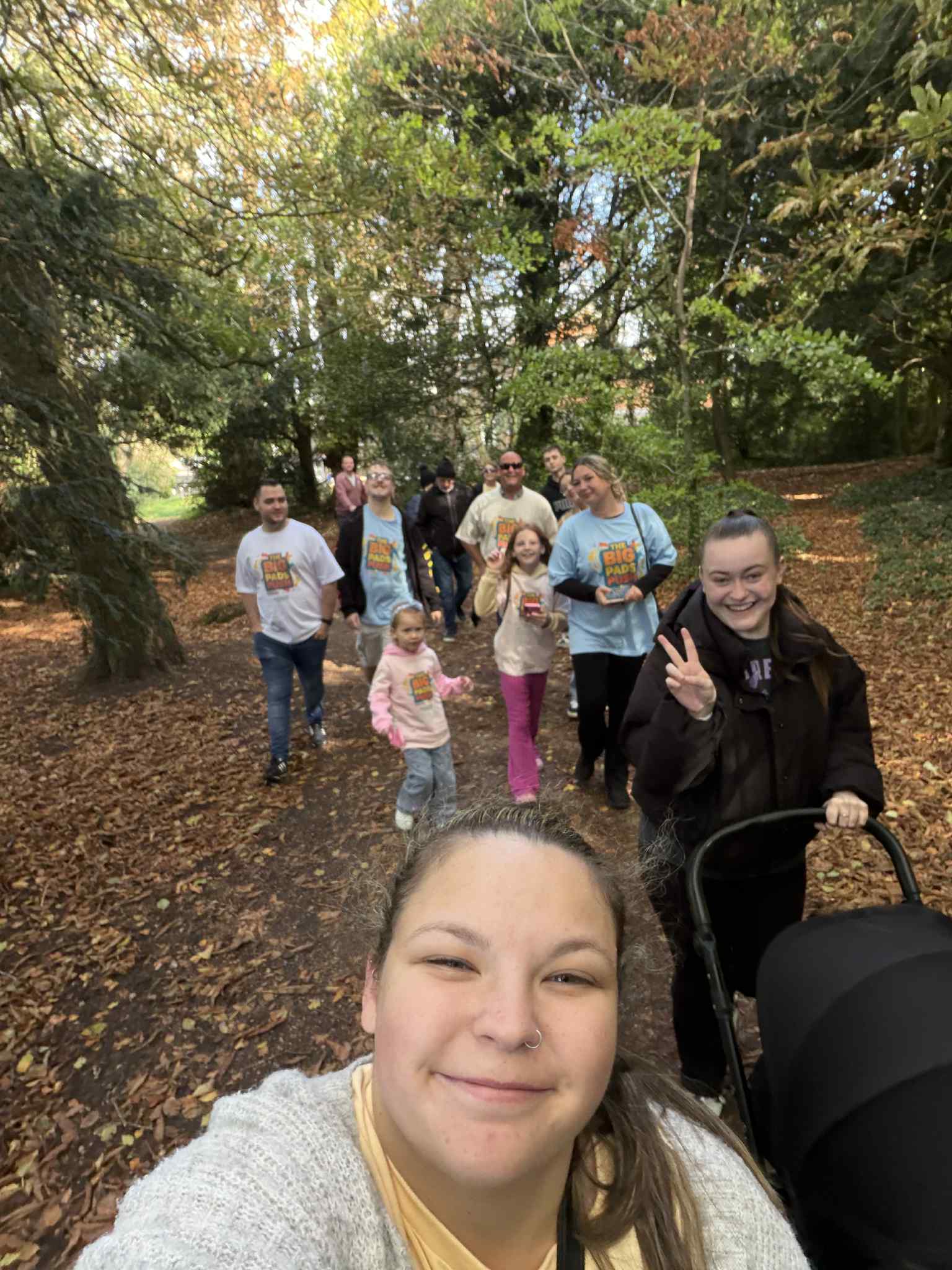 Sammi and her family taking a selfie on the big pads push